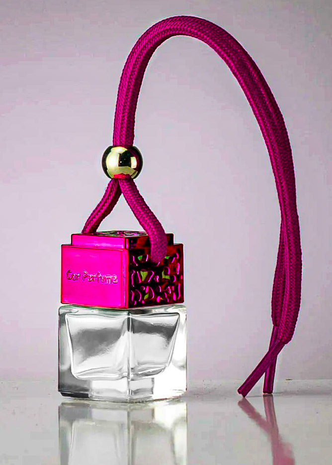 Perfume bottle with pink cap and strap | Merely Handcrafted