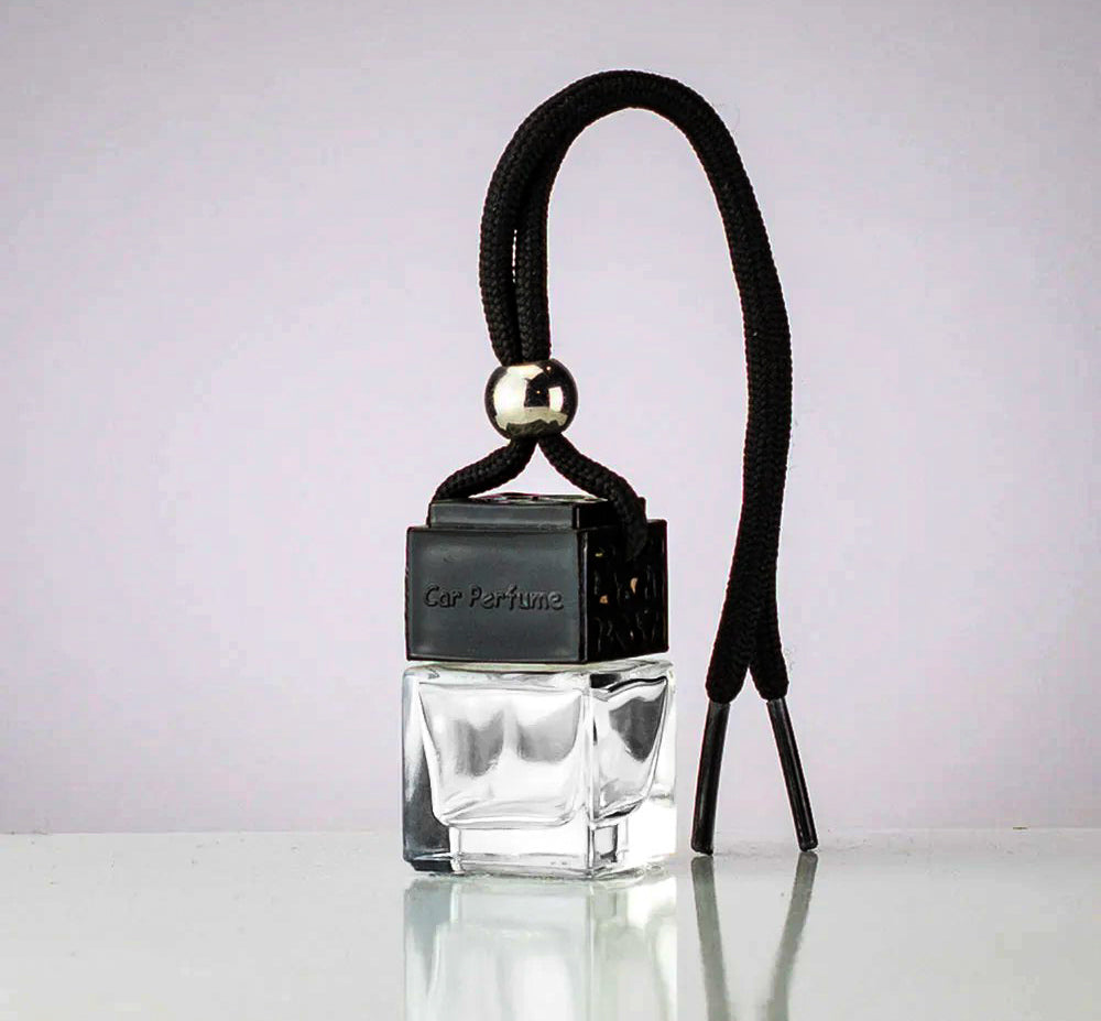 Car perfume with black strap on a white background | Merely Handcrafted
